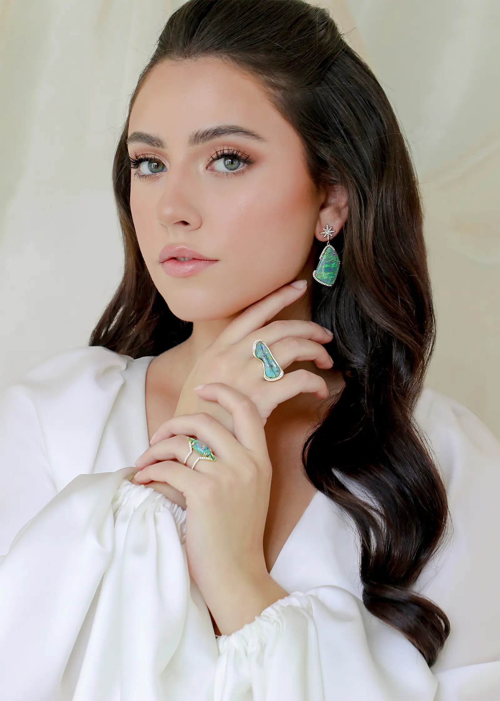 Model wearing Parle Black Opal Earrings and Rings